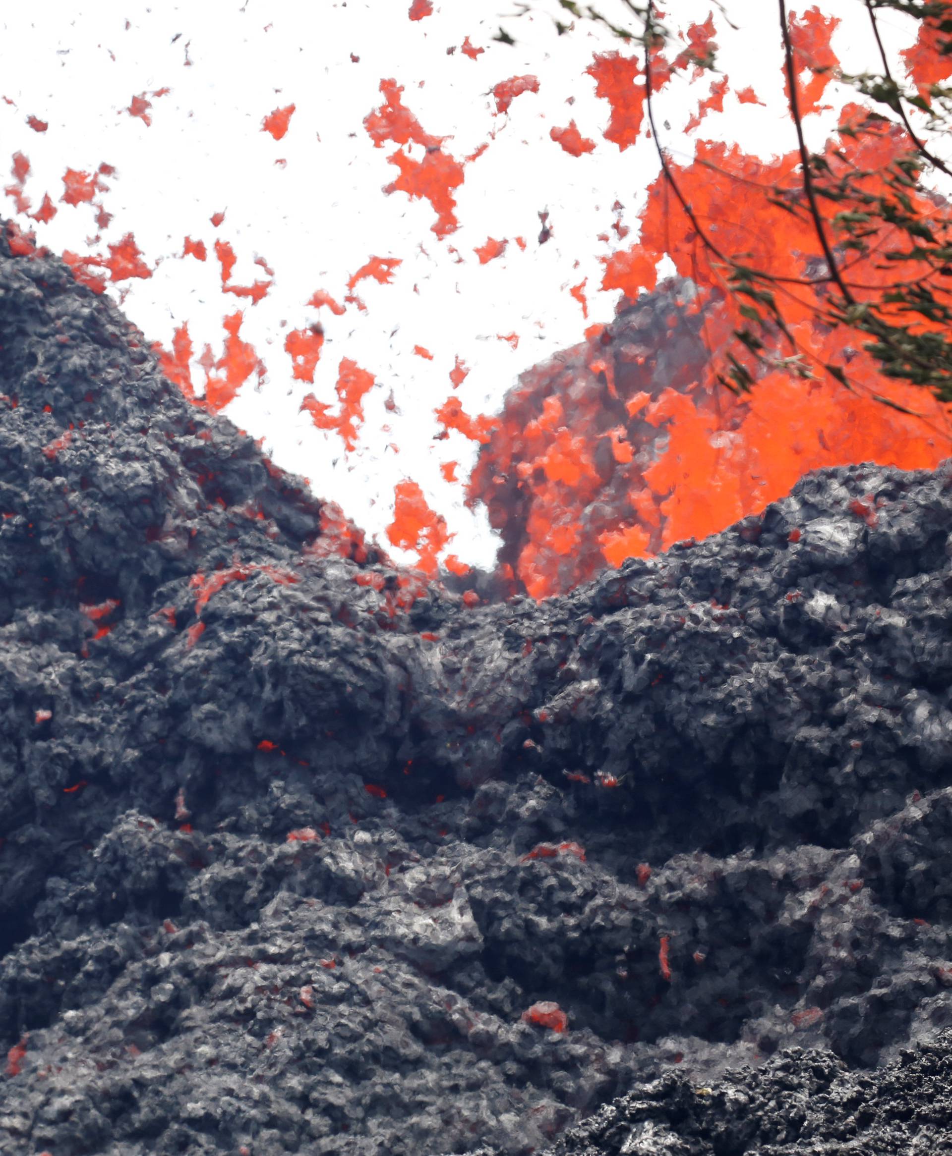 Lava erupts from a fissure east of the Leilani Estates subdivision during ongoing eruptions of the Kilauea Volcano