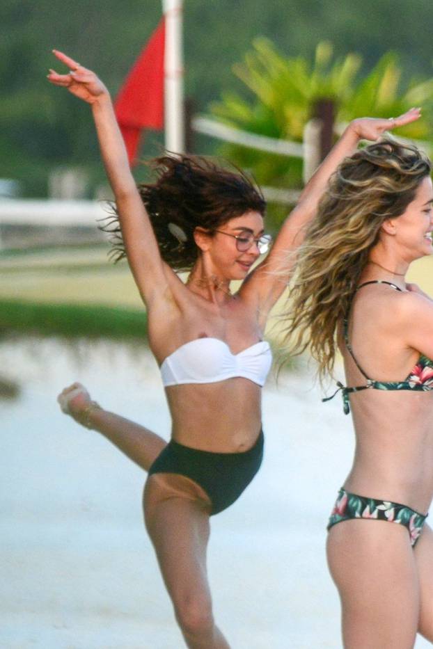 *EXCLUSIVE* Sarah Hyland suffers a wardrobe malfunction while enjoying the beach with her fiancee