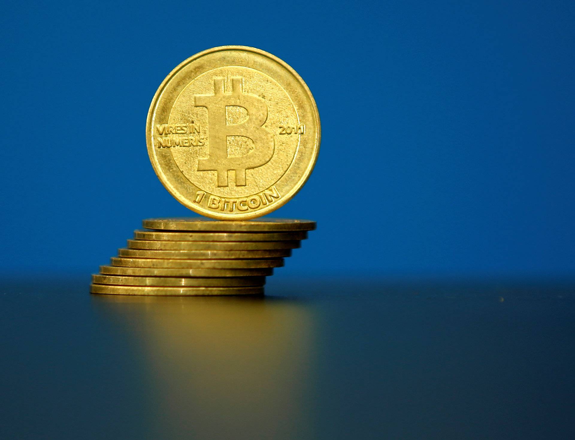 FILE PHOTO:An illustration photo of Bitcoin (virtual currency) coins are seen at La Maison du Bitcoin in Paris