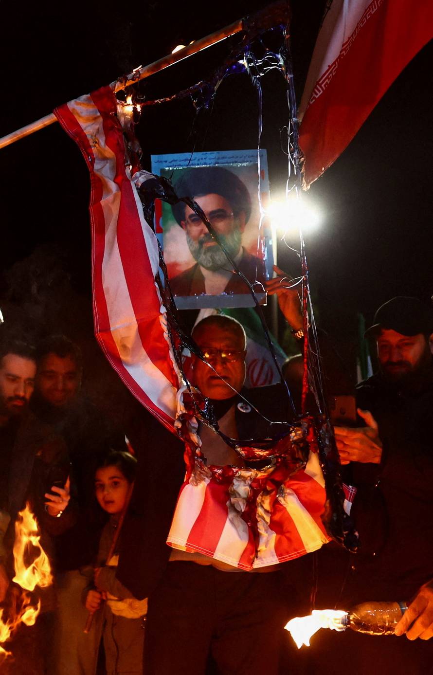 People gather after a two-week ceasefire in the Iran war was announced, in Tehran