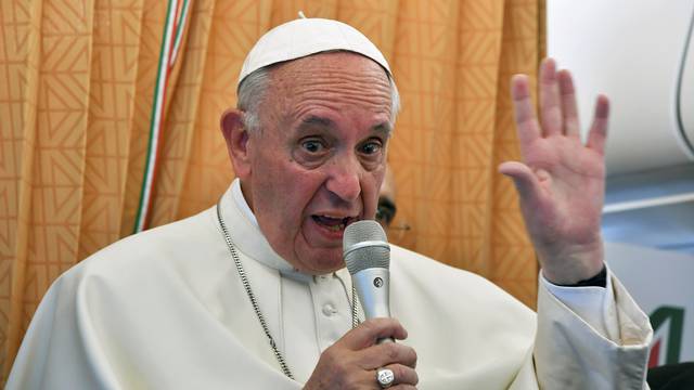 Pope Francis speaks to journalists on his flight back to Rome following a visit at Armenia