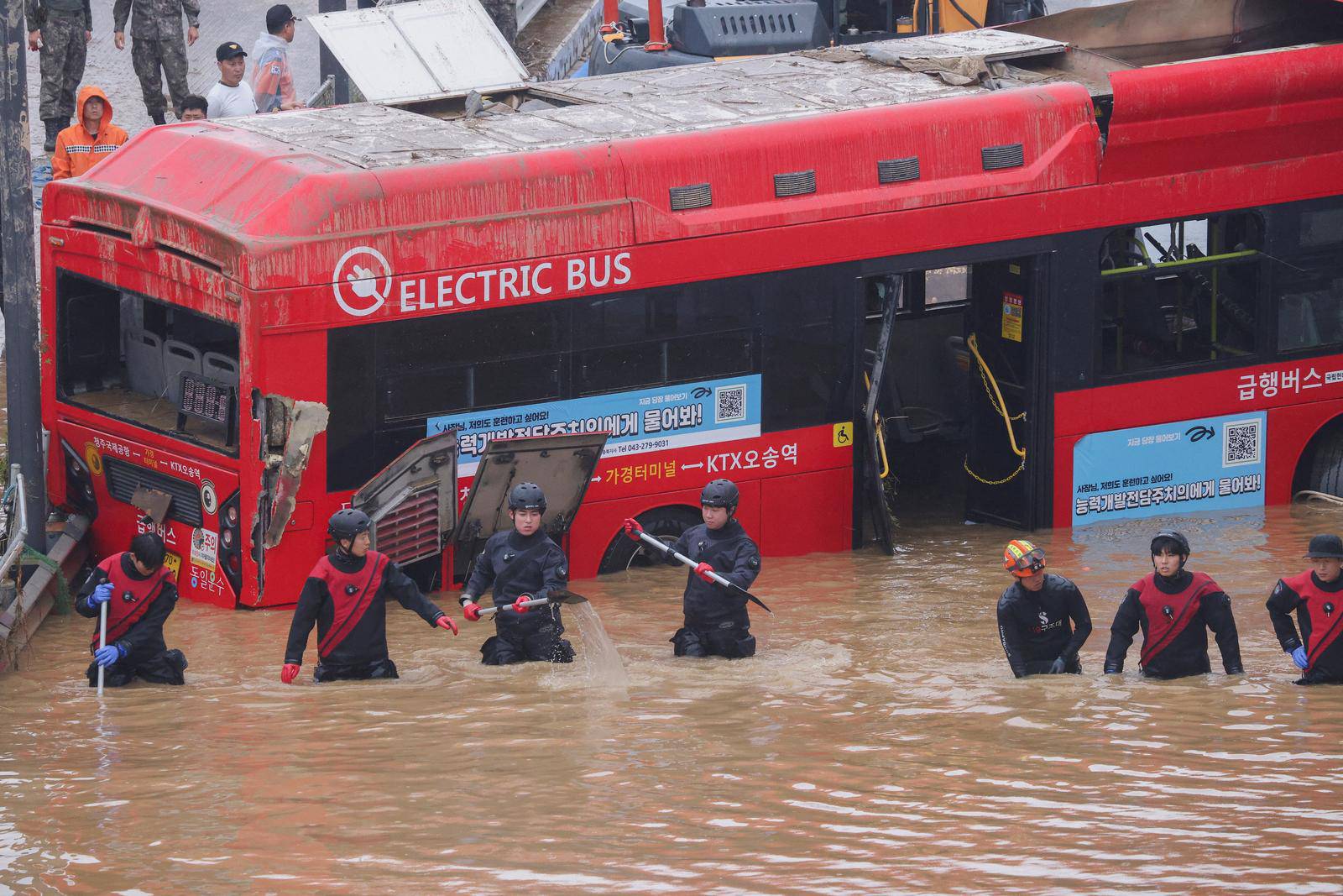 Search and rescue operation at an underpass that has been submerged by a flooded river caused by torrential rain in Cheongju