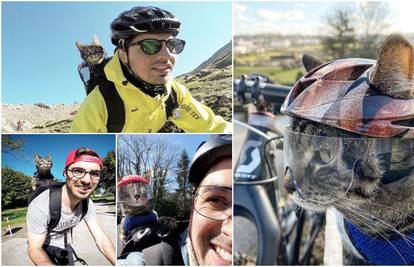 Bez svoje mačke nigdje: Skupa bicikliraju, planinare, jedu...