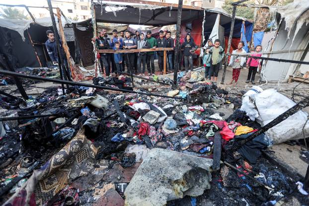 Aftermath of an Israeli strike on tents of displaced people, in Deir Al-Balah
