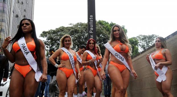 Miss BumBum Brazil 2016 pageant contestants pose at Paulista Avenue in Sao Paulo