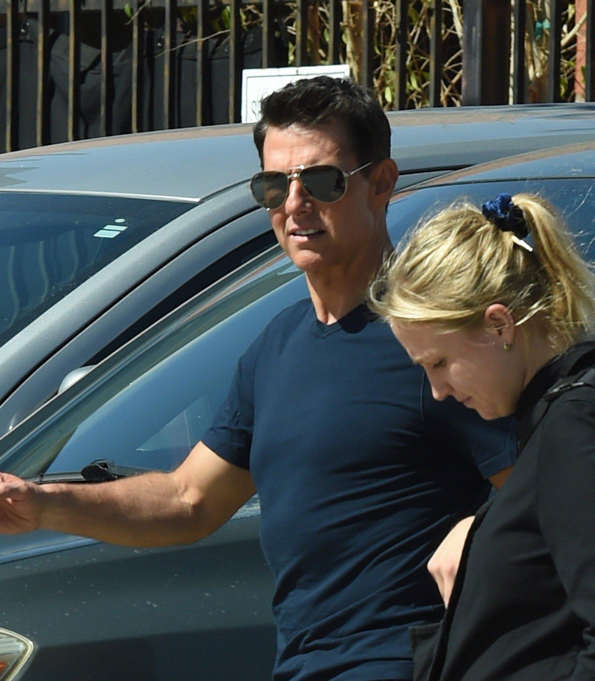 EXCLUSIVE: Tom Cruise is spotted heading to the studio with a female companion in Los Angeles.