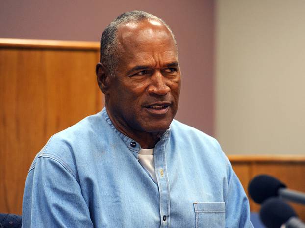 O.J. Simpson reacts during his parole hearing at Lovelock Correctional Centre in Lovelock