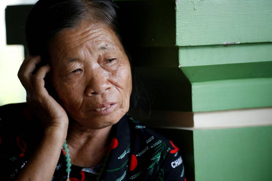 Anna Tran Thi Thanh, aunt of Anna Bui Thi Nhung, a Vietnamese suspected to be among dead victims found in a lorry in Britain, is seen at her home in Nghe An province