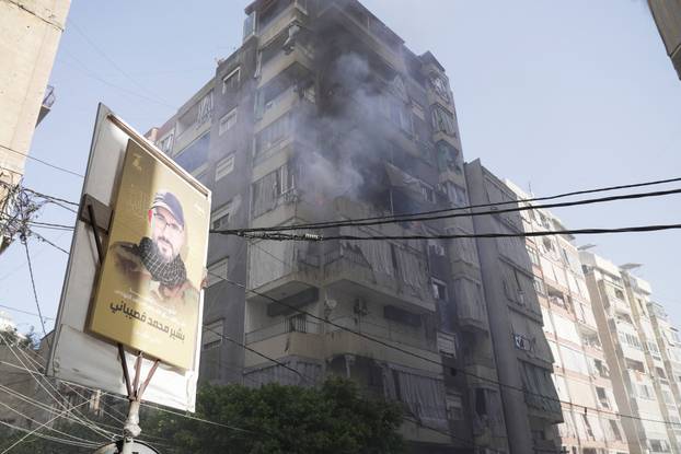 Smoke rises from a building following an Israeli air strike in Beirut