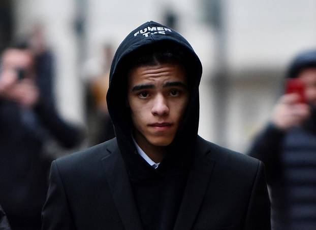 Manchester United's Mason Greenwood leaves the Manchester Magistrates court