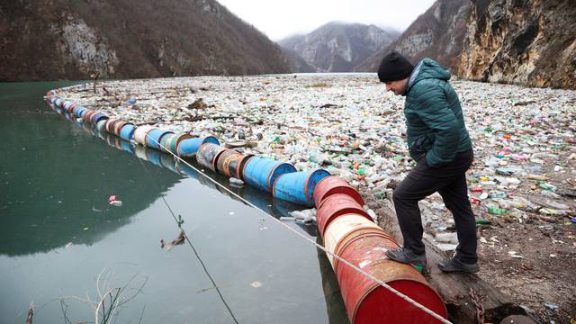 Tonnes of waste float the Drina river in Visegrad