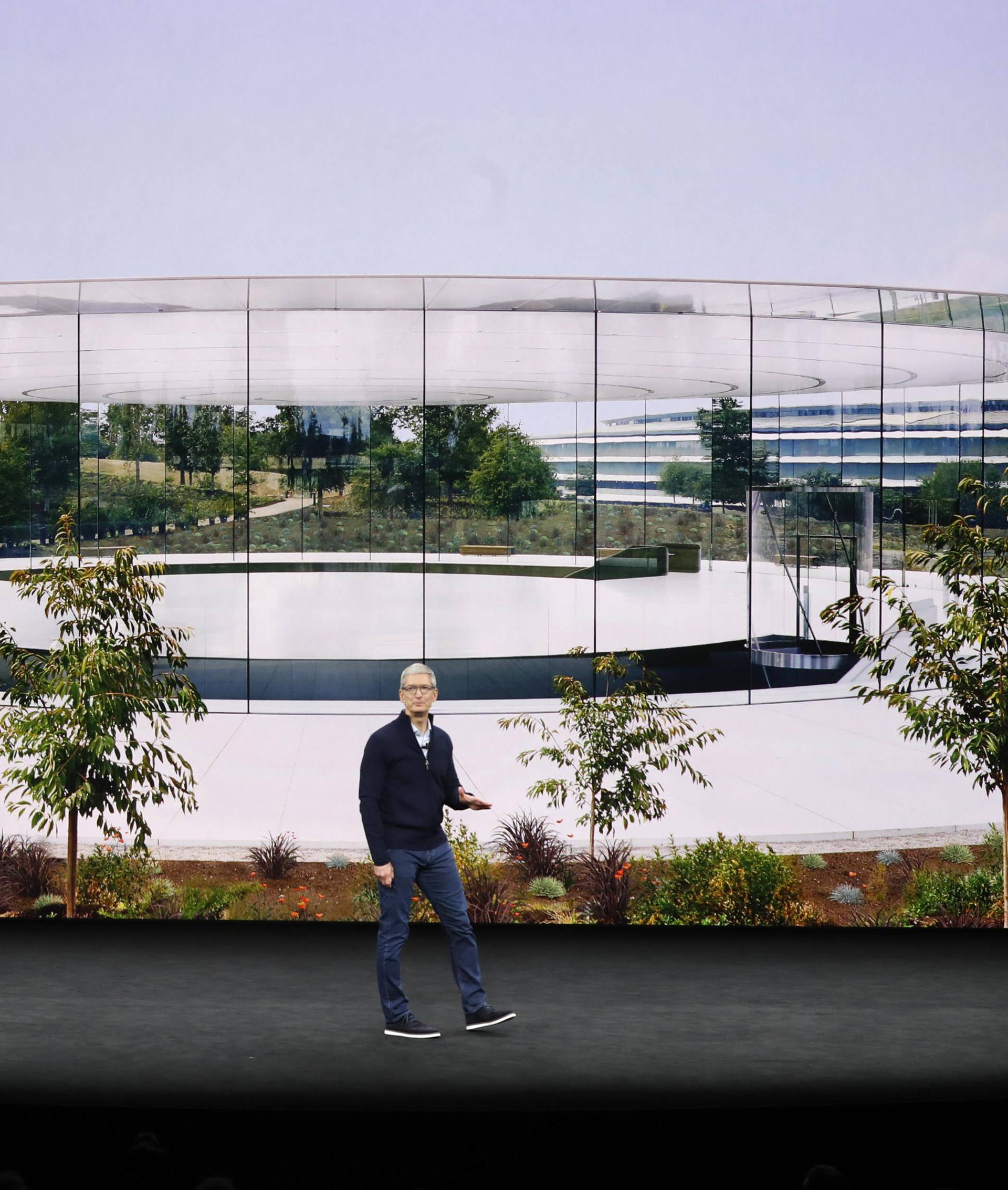 Apple's Tim Cook speaks during a product launch event in Cupertino