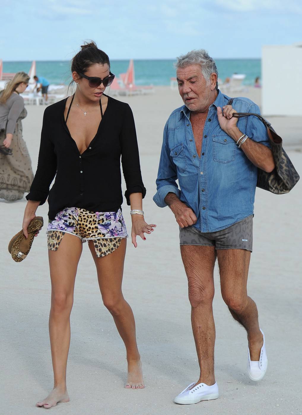 Roberto Cavalli and his much younger girlfriend Lina Nilson enjoy some sun and sand on Miami Beach