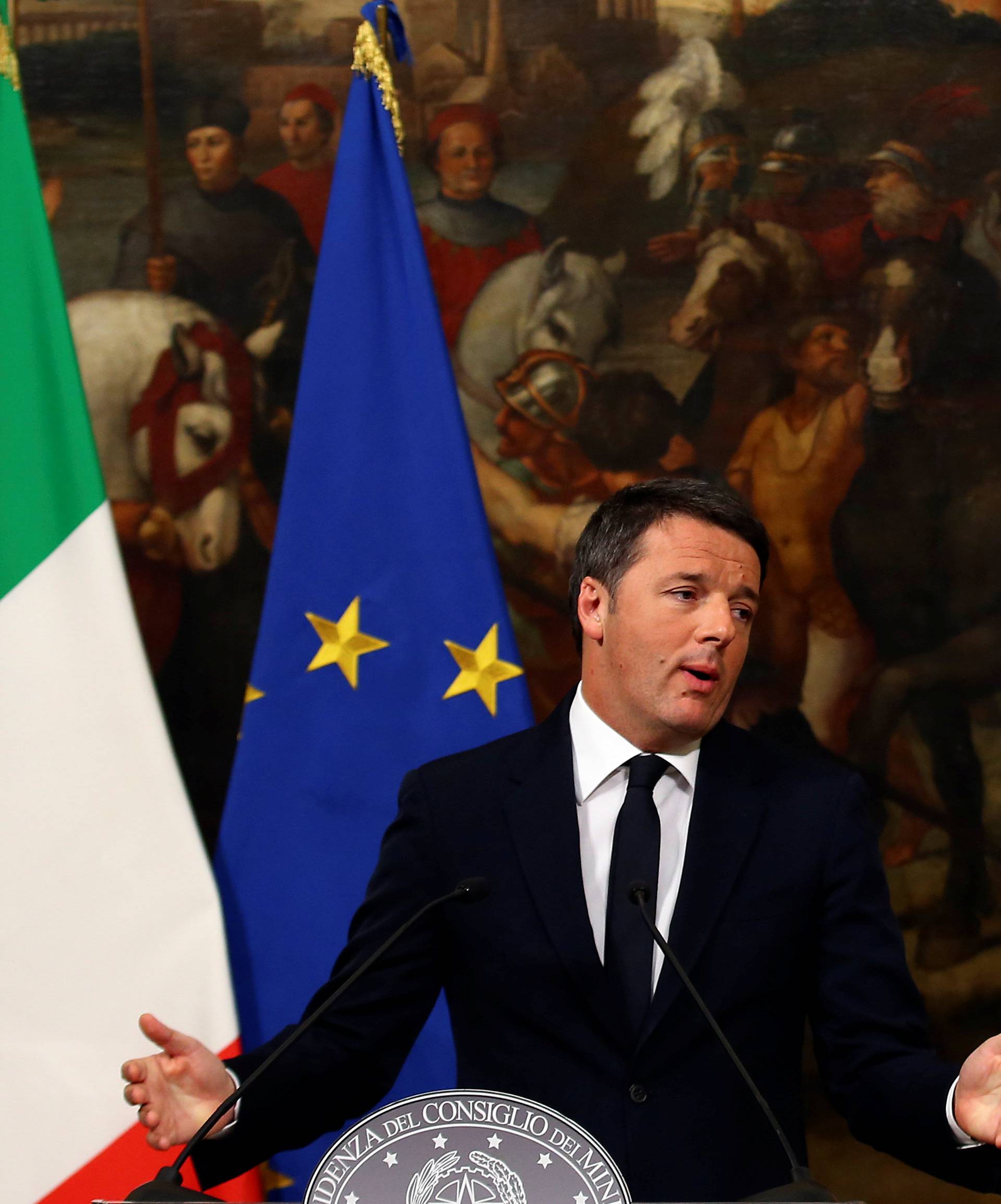 Italian Prime Minister Matteo Renzi speaks during a media conference after a referendum on constitutional reform  at Chigi palace in Rome