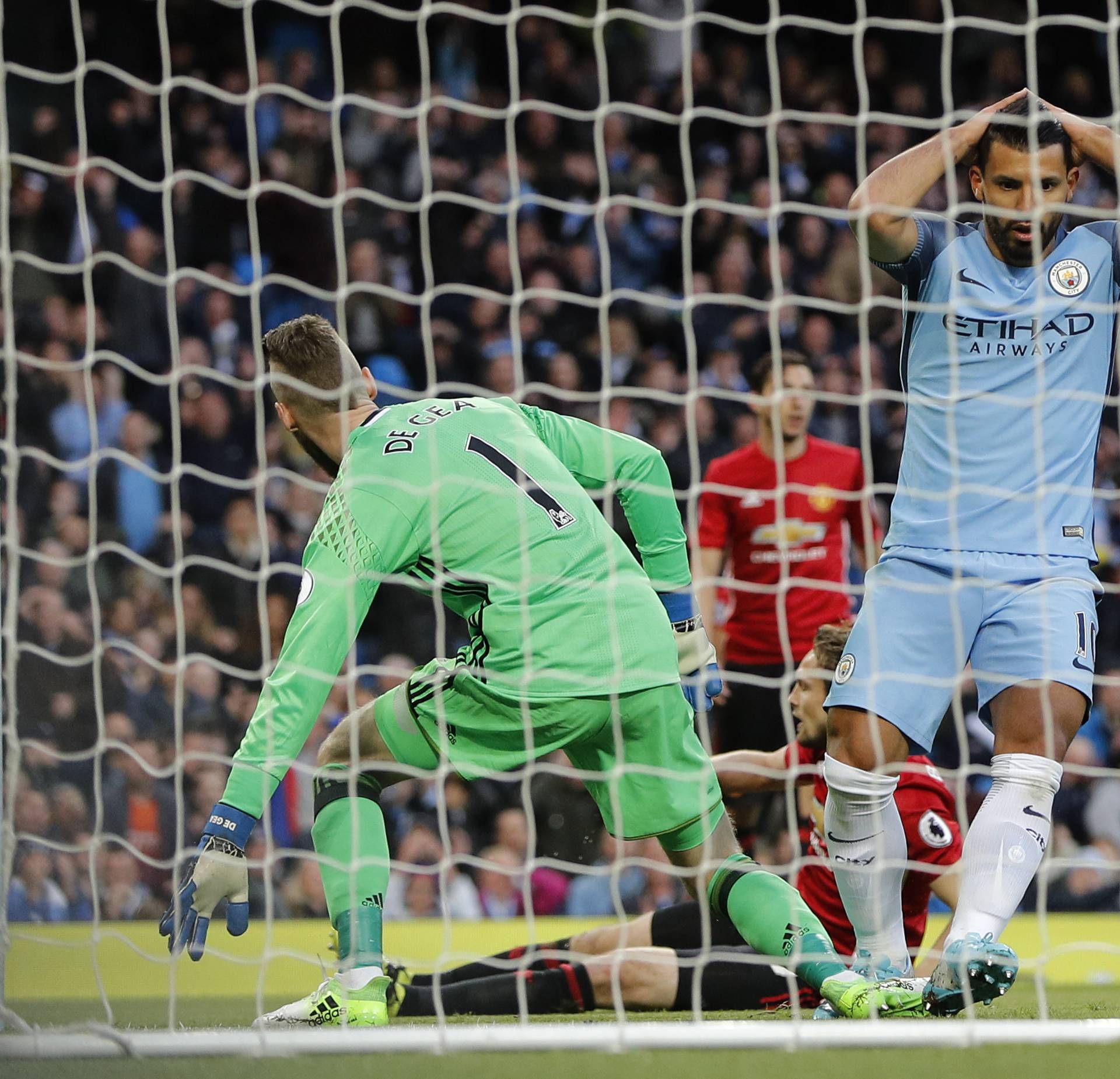 Manchester City's Sergio Aguero looks dejected after a missed chance