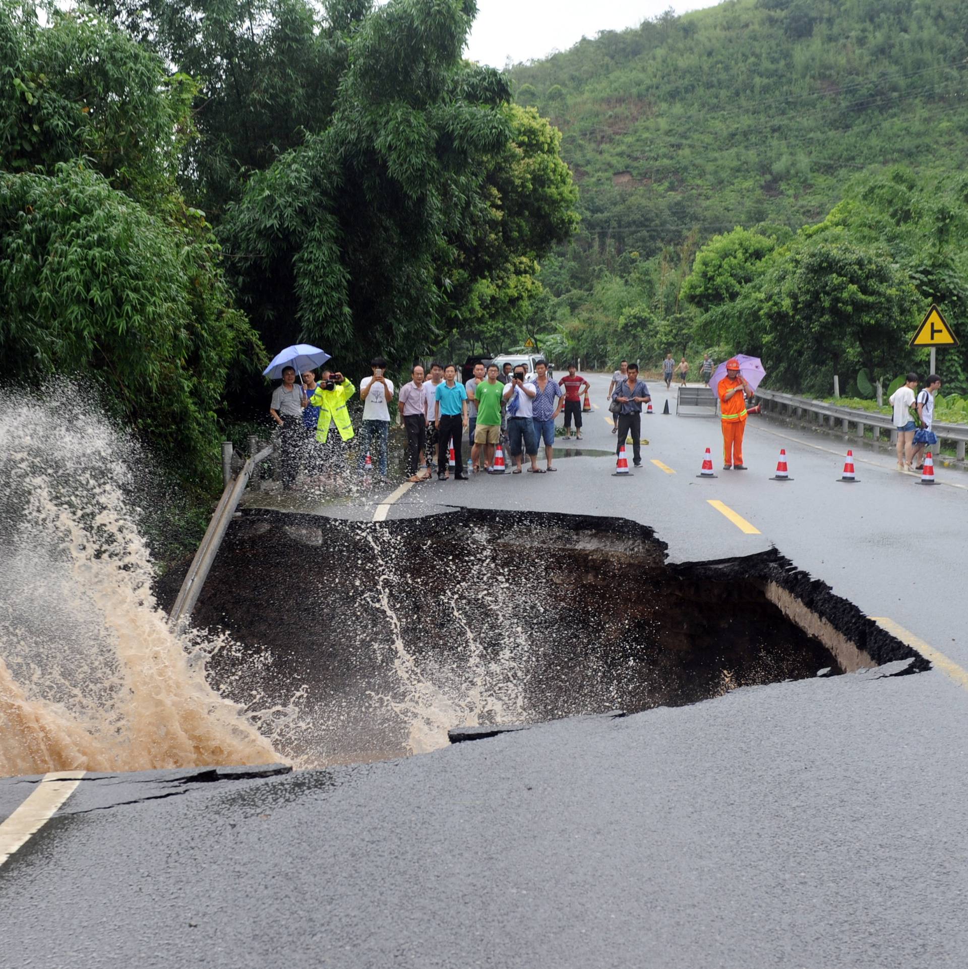 A road is seen damaged by heavy rainfall as Typhoon Nepartak lands in Fuzhou