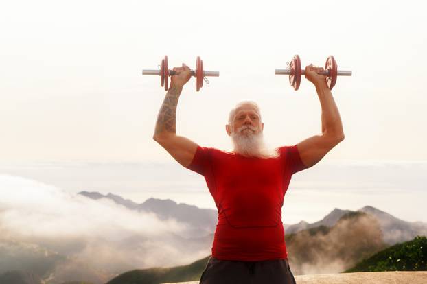 Senior man doing sport exercises