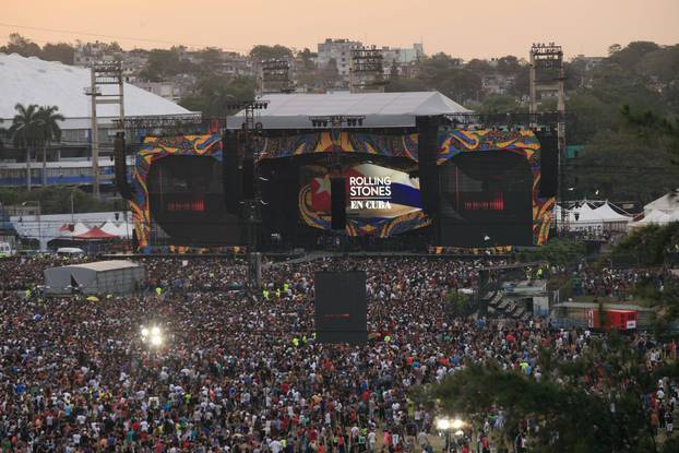 Fans wait for the free outdoor concert by the Rolling Stones at Ciudad Deportiva de la Habana sports complex in Havana