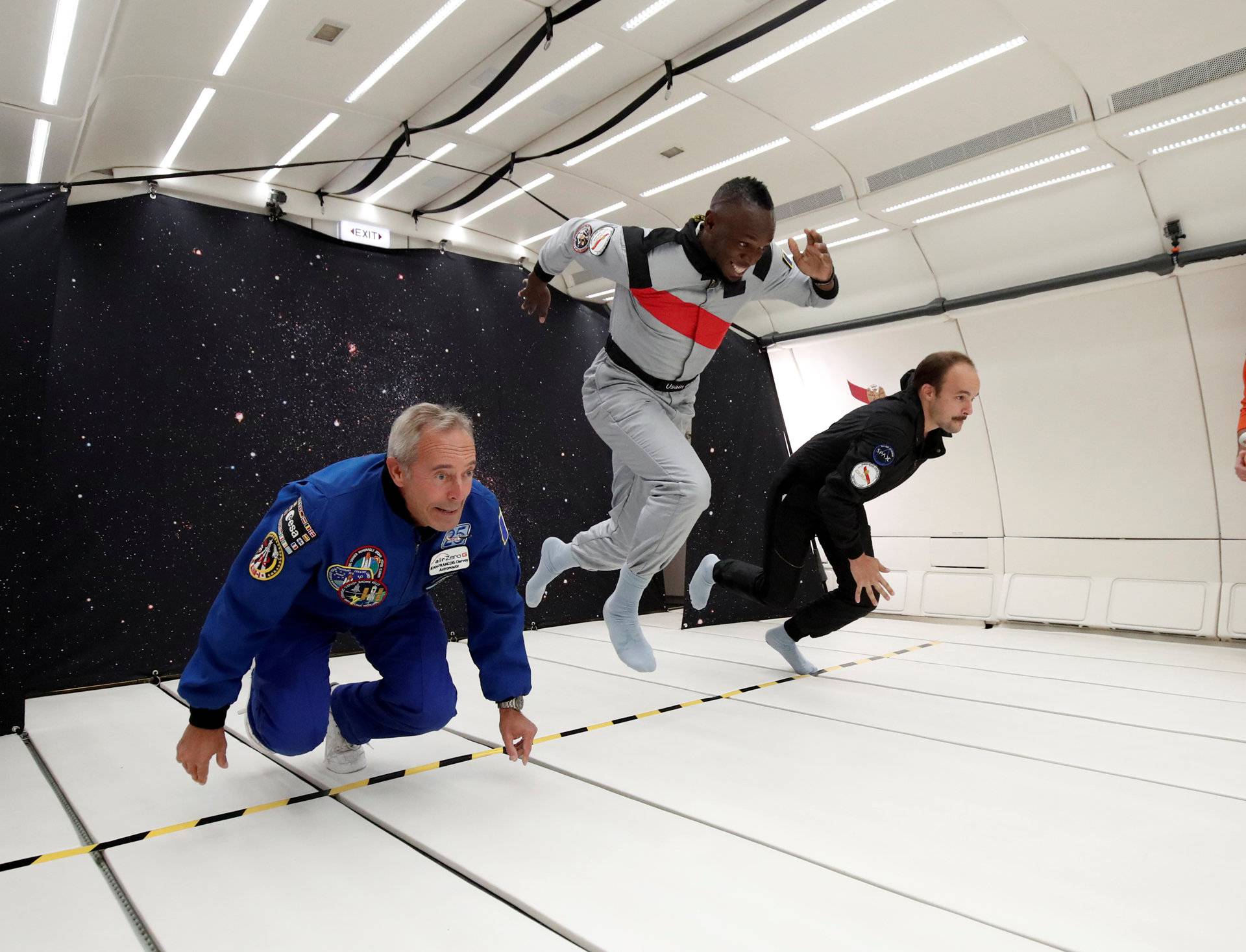 Retired sprinter Usain Bolt, French astronaut Jean-Francois Clervoy and French Interior designer Octave de Gaulle enjoy zero gravity conditions during a flight in a specially modified plane above Reims