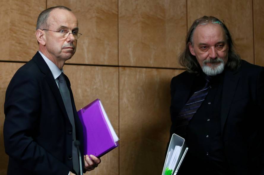 Tim van Beveren und Guenter Lubitz leave a news conference in Berlin