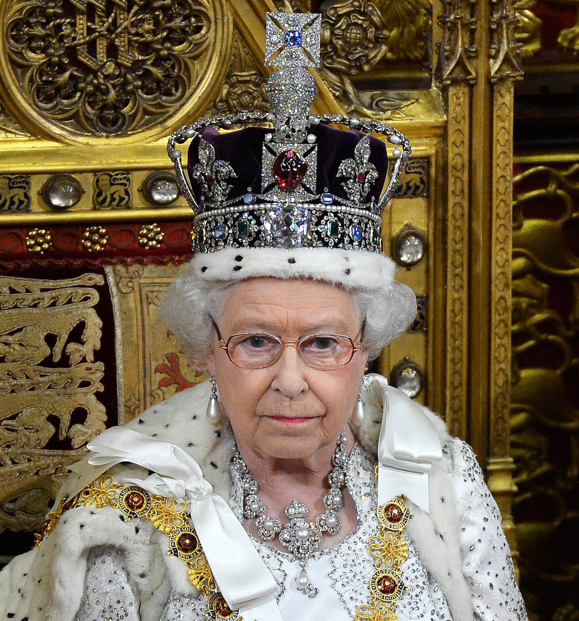 FILE PHOTO: Britain's Queen Elizabeth waits before delivering her speech in the House of Lords, during the State Opening of Parliament at the Palace of Westminster in London