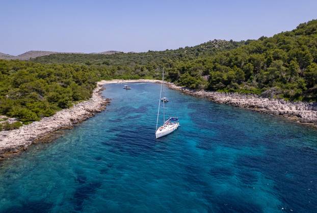 A drone view shows anchored boats in the Nature park Telascica on Dugi Otok