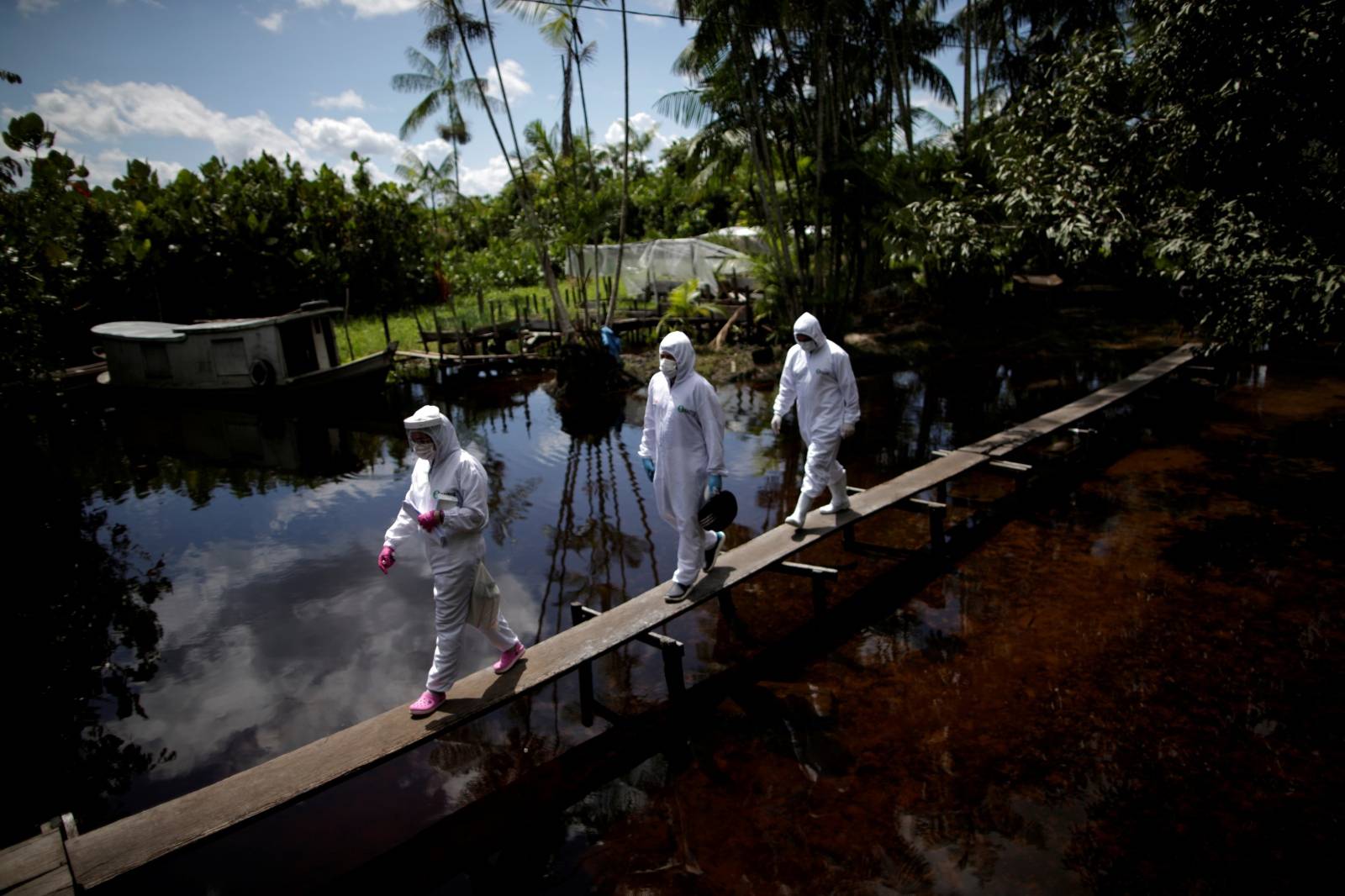 The Wider Image: "How many people are going to die?" - COVID-19 races up the Amazon