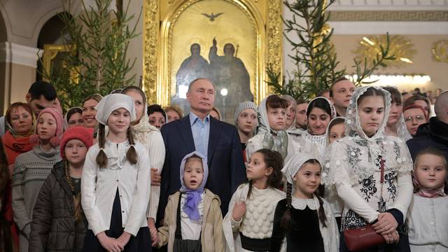 Russian President Putin attends the Orthodox Christmas service in Saint Petersburg