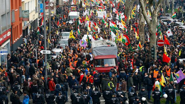 Pro-Kurdish people attend a demonstration in Cologne