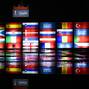 Port workers in Hamburg stack containers with flags of the Euro 2024 teams in accordance with the Euro 2024 draw