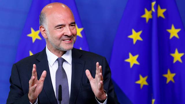 European Economic and Financial Affairs Commissioner Moscovici speaks during a news conference in Brussels
