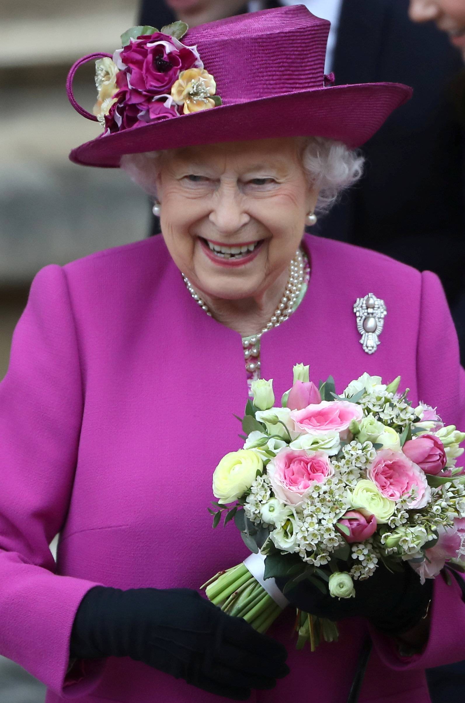 Britain's Queen Elizabeth leaves the annual Easter Sunday service at St George's Chapel at Windsor Castle in Windsor