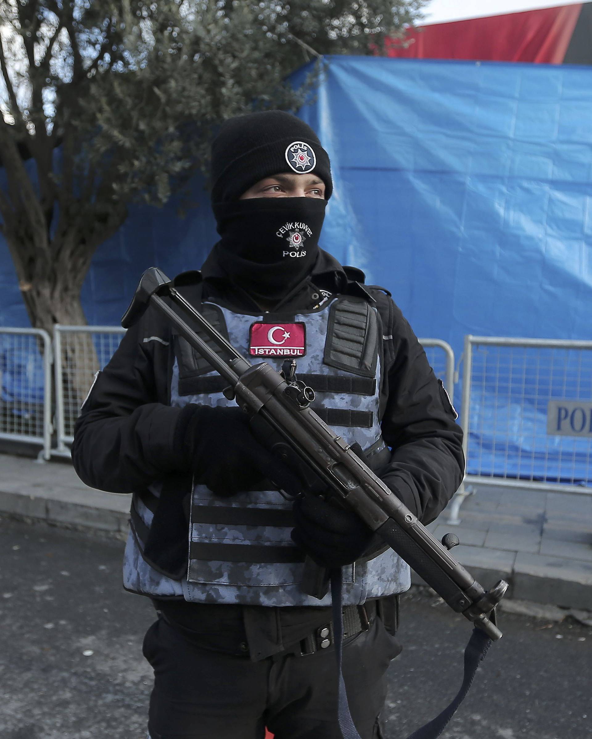 Turkish police stand guard outisde the Reina nightclub by the Bosphorus, which was attacked by a gunman, in Istanbul