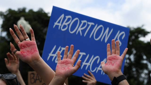 Abortion rights supporters demonstrate outside the United States Supreme Court, in Washington