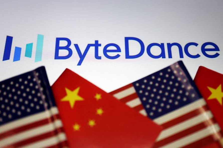 FILE PHOTO: Illustration picture of Bytedance logo with Chinese and U.S. flags