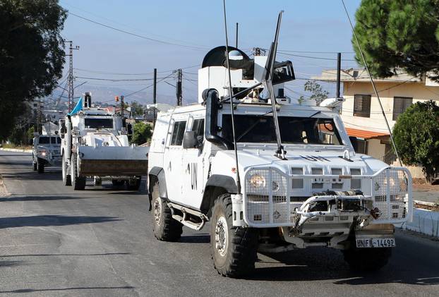 UN peacekeepers (UNIFIL) vehicles drive in Marjayoun