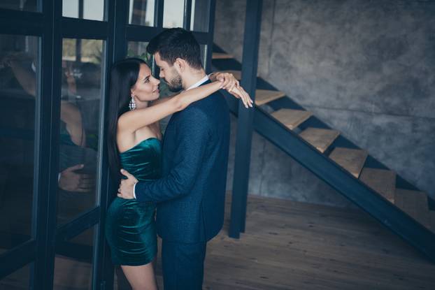 Profile photo of horny couple guy stylish trendy lady leaning glass wall door tempting prelude intimate erotic intense desire wear formalwear blue suit short shiny dress loft indoors