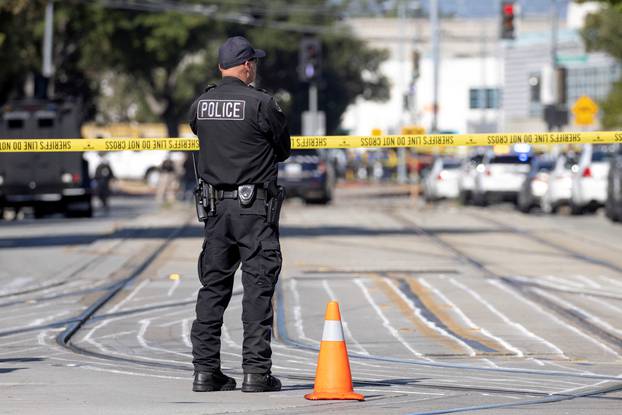Police secure the scene of a mass shooting in San Jose
