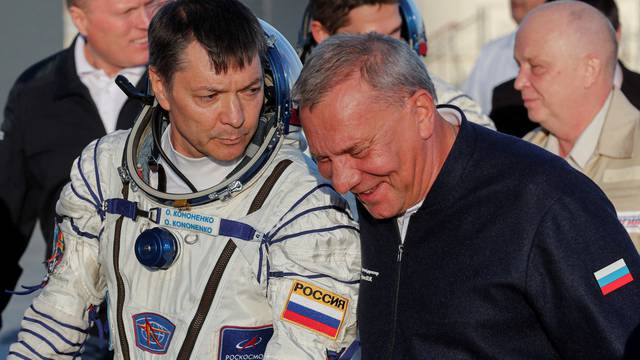 FILE PHOTO: Crew board Soyuz MS-24 spacecraft at Baikonur cosmodrome