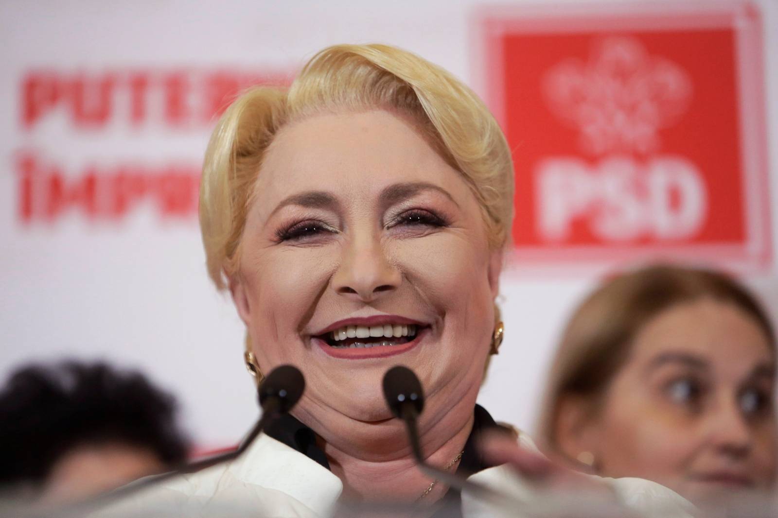 Former Romanian Prime Minister and presidential candidate Viorica Dancila reacts during a news conference marking the end of the first round of the presidential election