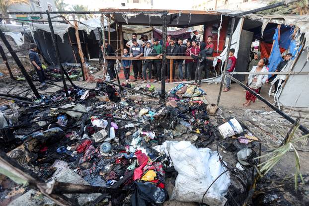 Aftermath of an Israeli strike on tents of displaced people, in Deir Al-Balah