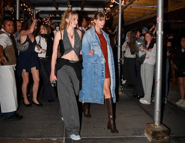 Taylor Swift and Sophie Turner seen at Via Carota Italian restaurant in the West Village