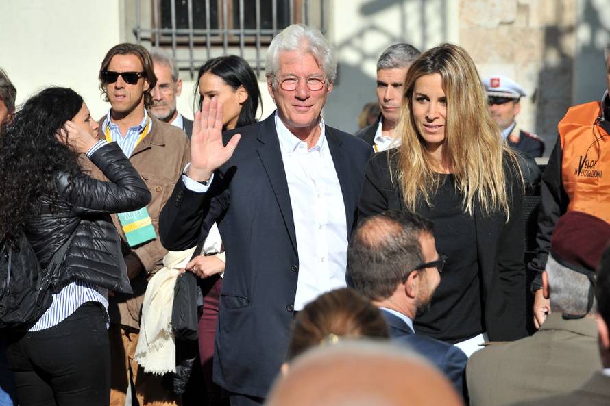 Pisa, The Dalai Lama (accompanied by Richard Gere) meets the public and the schools