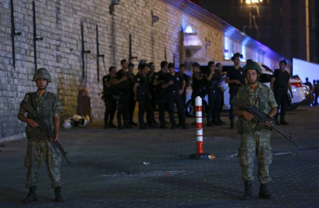 Turkish military stand guard near the the Taksim Square in Istanbul