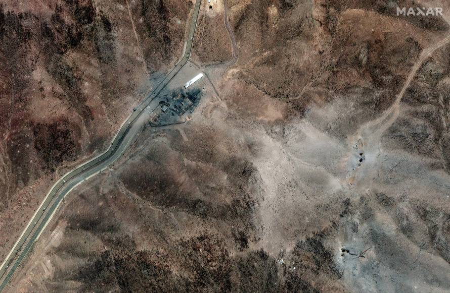 A satellite image shows new airstrike craters on the perimeter of the Fordow Fuel Enrichment Facility, near Qom