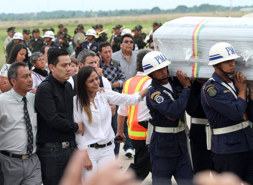 Relatives of Bolivian crew member Sisy Arias, who died when the plane carrying Brazilian soccer team Chapecoense crashed in Colombia, react as the bodies of victims arrive at Viru Viru airport in  Santa Cruz