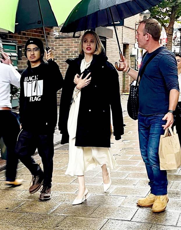 *EXCLUSIVE* Angelina Jolie shows off her blonde look spotted on set with her son Maddox as filming begins for her latest movie 'Anxious People' out in London.