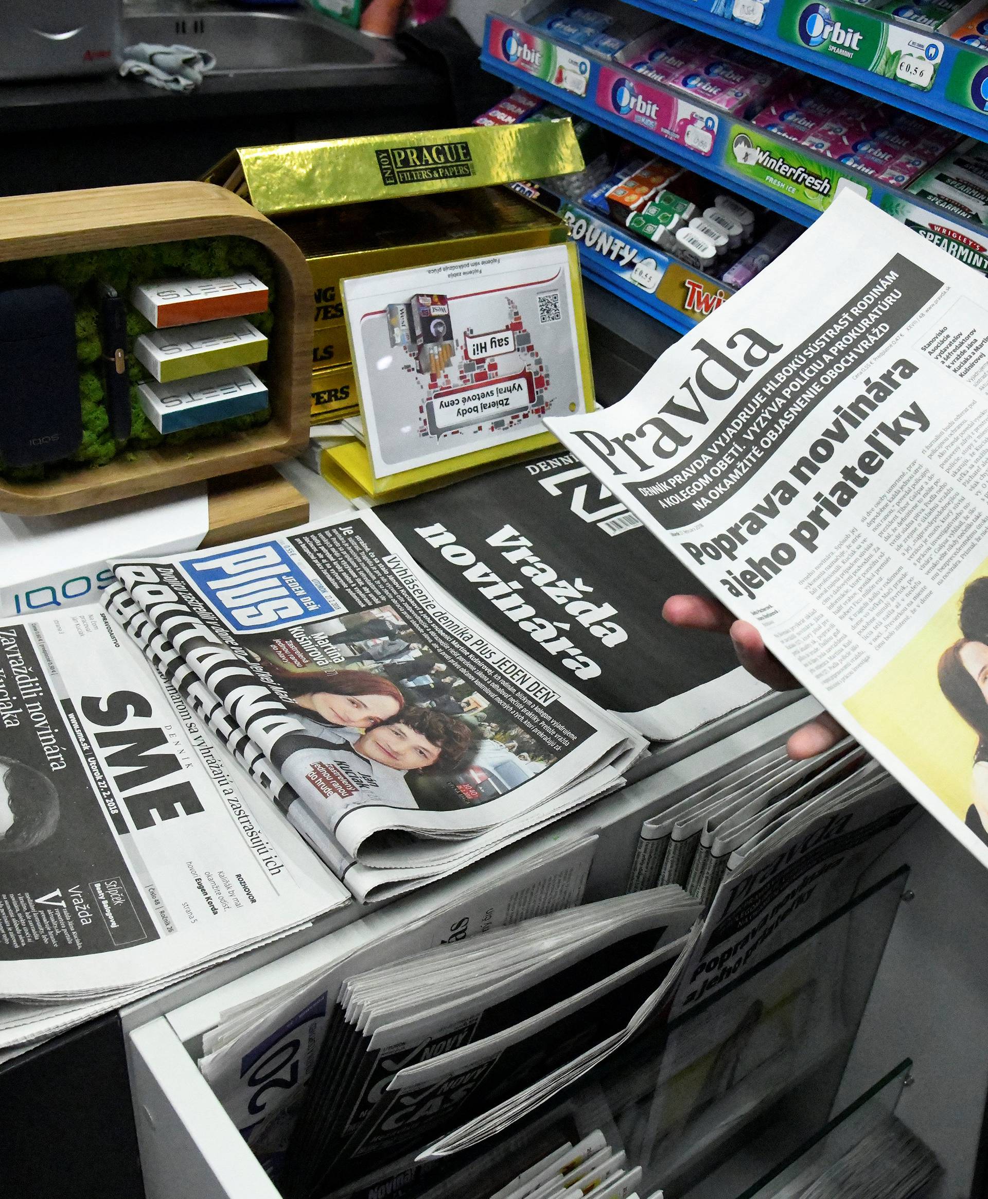 Front pages of Slovak newspapers are seen with headlines about and portraits of murdered Slovak investigative journalist Jan Kuciak and his girlfriend Martina Kusnirova, in a shop in Trnava