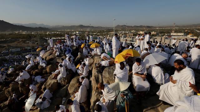 Muslim pilgrims arrive at the plain of Arafat during the annual haj pilgrimage
