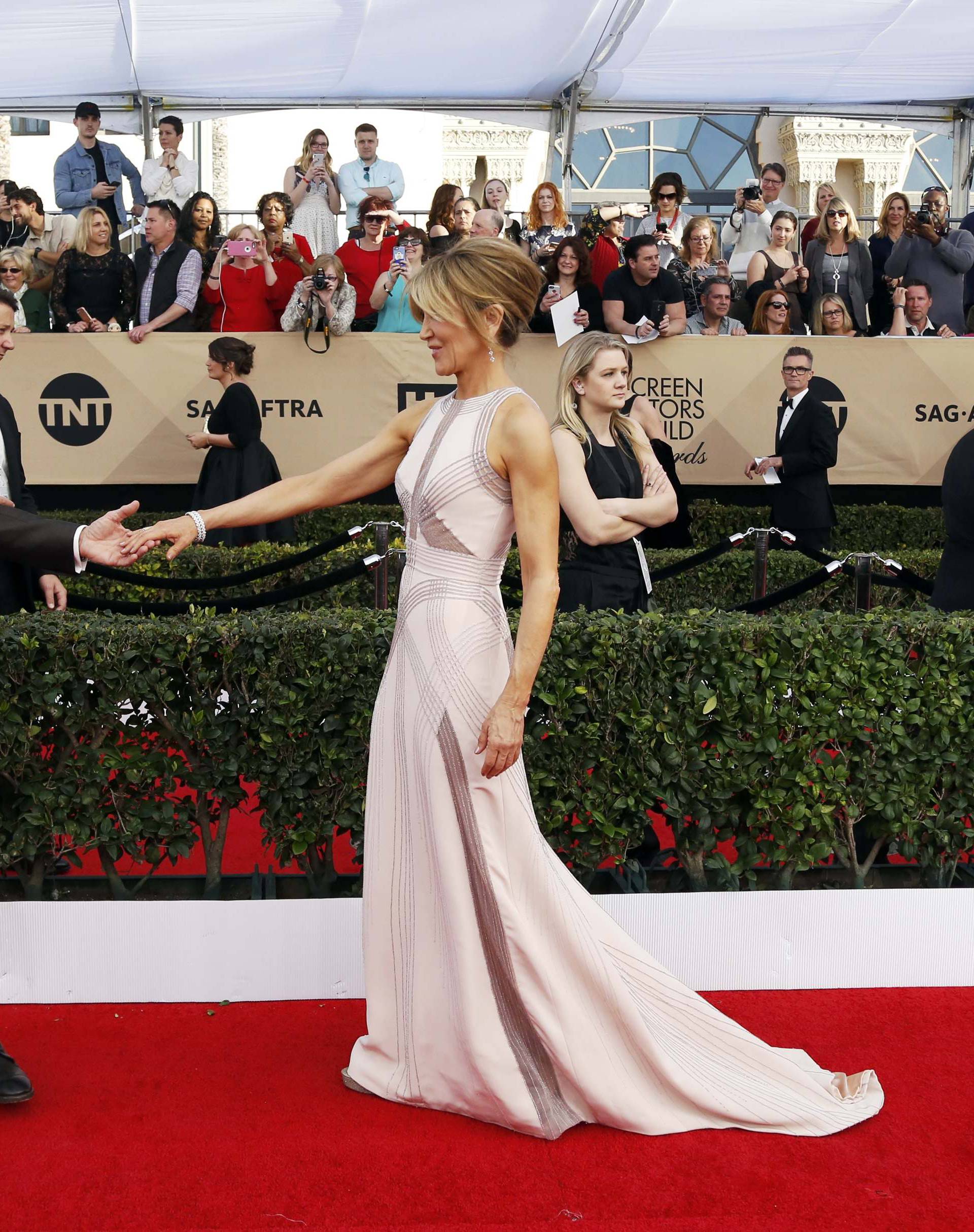 William H. Macy and Felicity Huffman arrive at the 23rd Screen Actors Guild Awards in Los Angeles